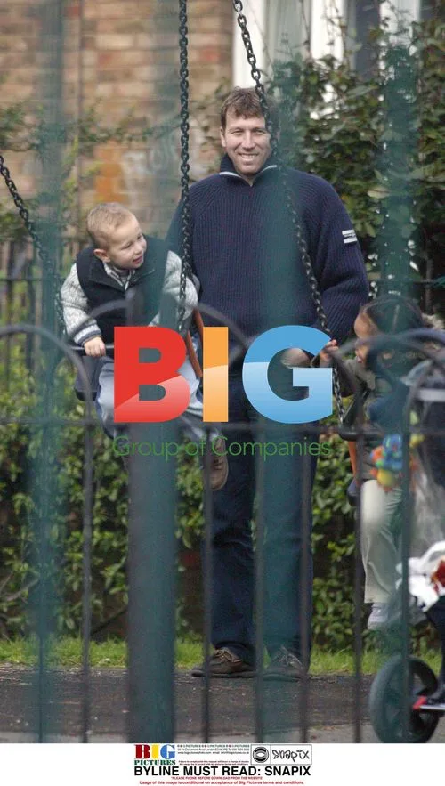 Mike Atherton with son at playground