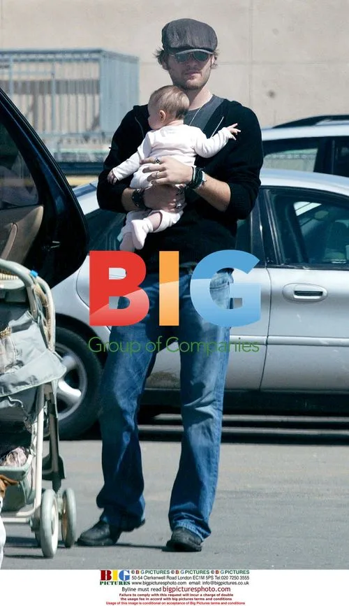 Mira Sorvino's Husband Gets Stroller Ready