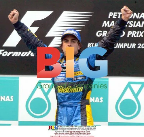 Alonso celebrates Renault's Malaysian GP win