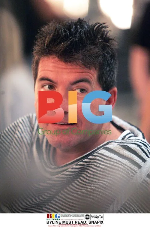 Simon Cowell Gets Haircut in London