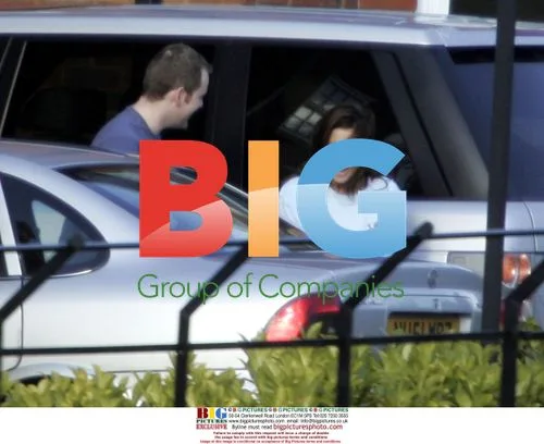 Kerry Katona and Dave Cunningham outside home