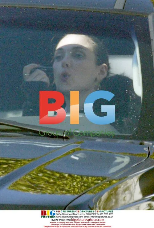 Winona Ryder Driving and Applying Makeup