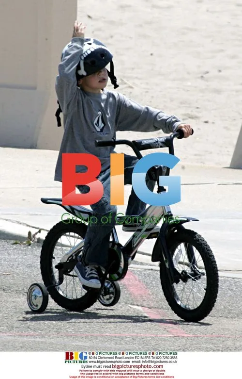 Pierce Brosnan and son Paris bike lesson