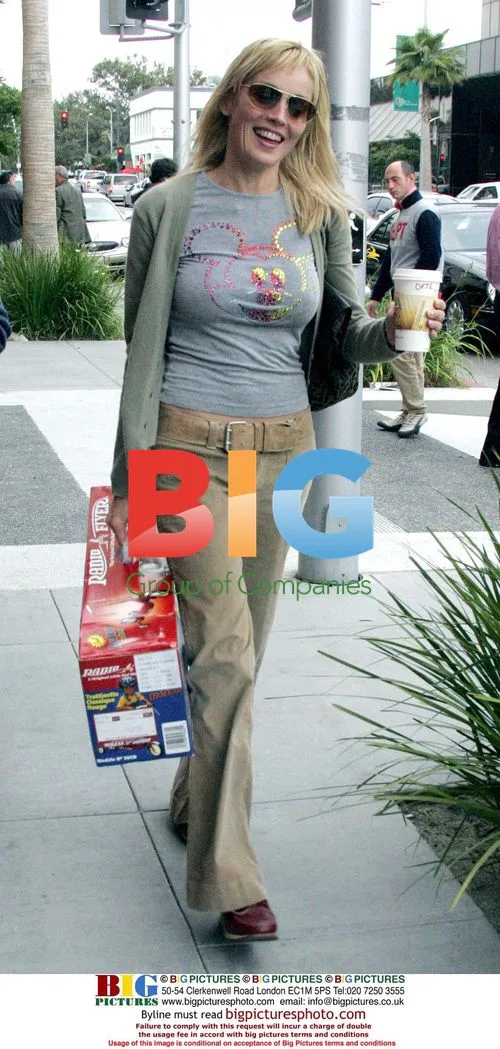 Sharon Stone picks up coffee before toy shopping