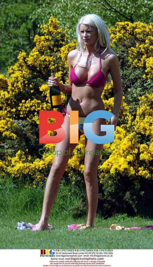 Model Emma B and Friend Frolic in Park
