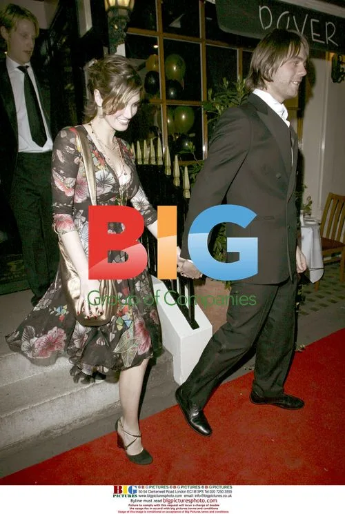 Brian McFadden and Delta Goodrem leave charity party