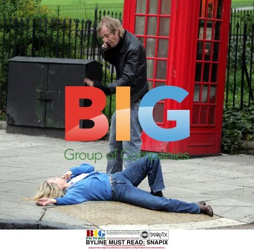 Rhys Ifans approached by merry friend in London