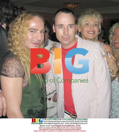 Designer John Galliano and David Furnish at Flavio Briatore Launch Party