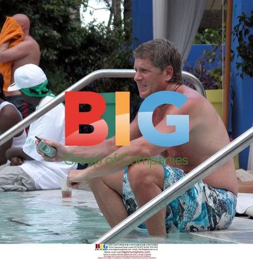 Donnie Deutsch by pool in Miami