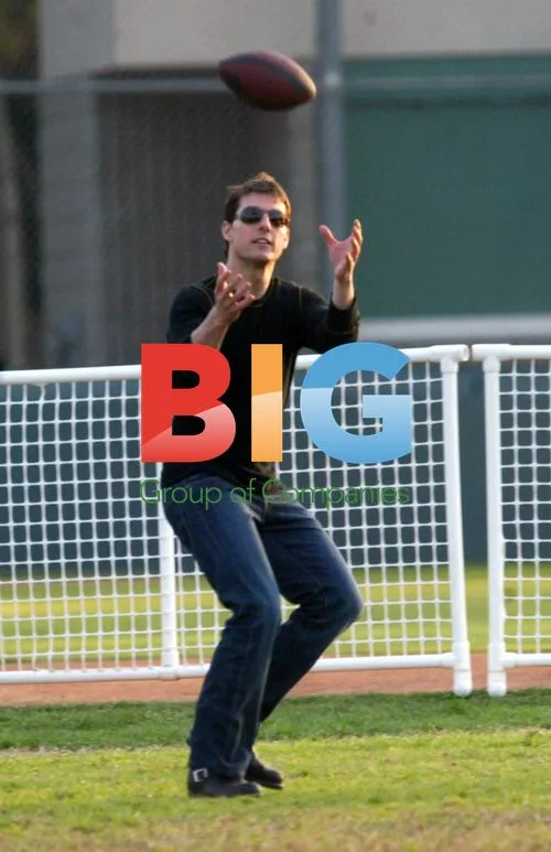 Tom Cruise, Katie Holmes, and son at soccer game