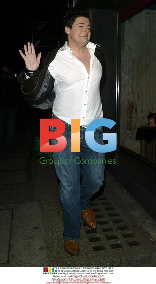 Craig Coates and Friend Leaving Club After Fundraiser