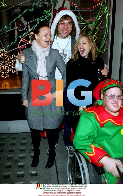 Madonna, Stella McCartney, David Walliams, and Matt Lucas at Stella McCartney store Christmas lights