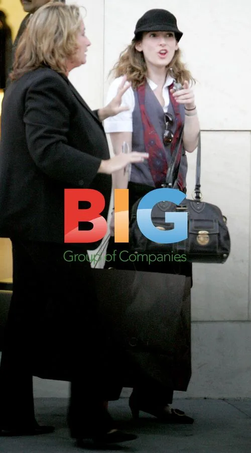 Winona Ryder Shops at Luis Vuitton