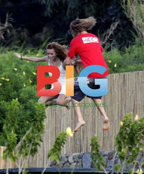 Mary-Kate Olsen and Stavros Niarchos on Trampoline in Hawaii