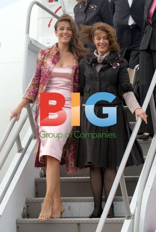 Elizabeth Hurley and Evelyn Lauder exit SONGS Pink Plane