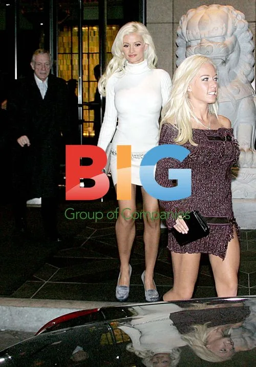 Hugh Hefner with 'Girls Next Door' stars