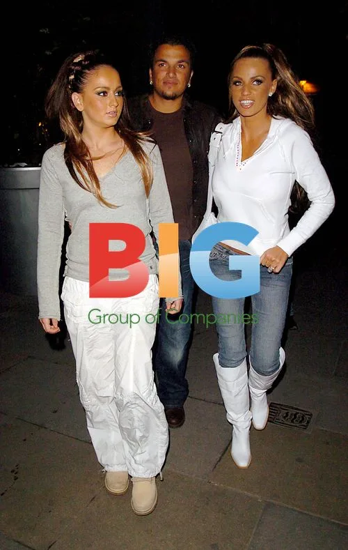 Model Jordan Leaves Hotel with Peter Andre