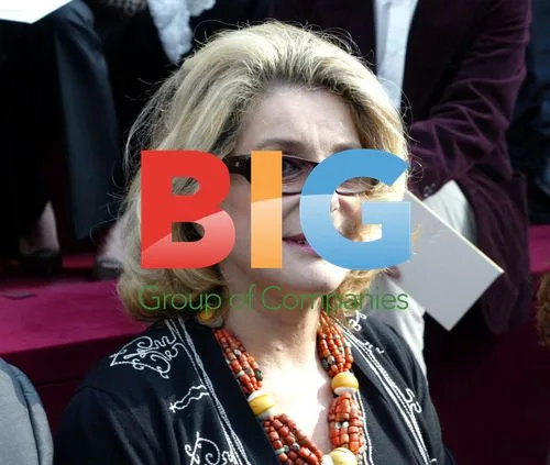 Catherine Deneuve at Yves Saint Laurent Fashion Show