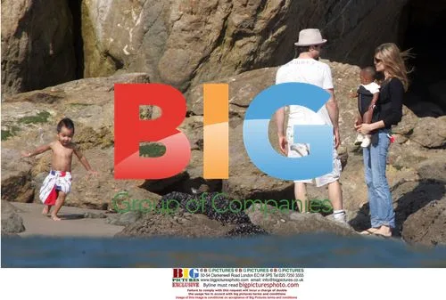 Brad Pitt and Angelina Jolie with kids at the beach