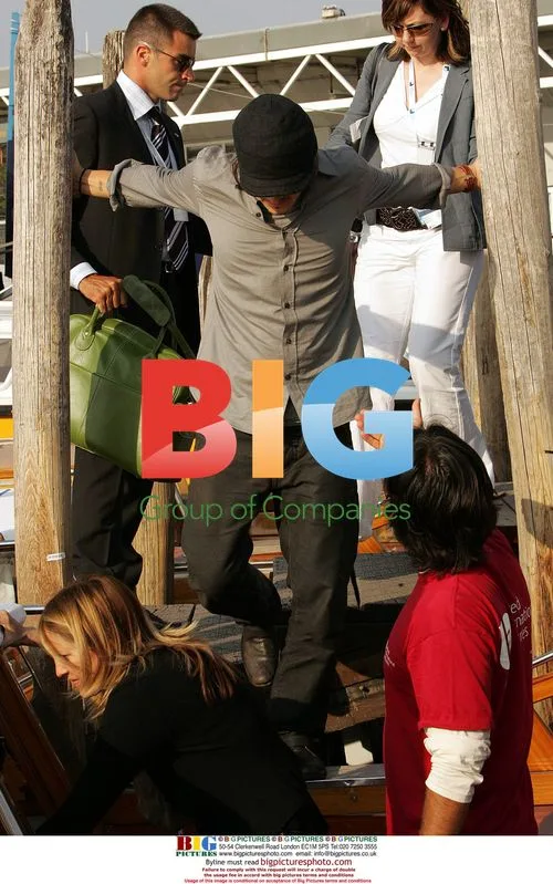 Orlando Bloom Boarding Water Taxi in Venice