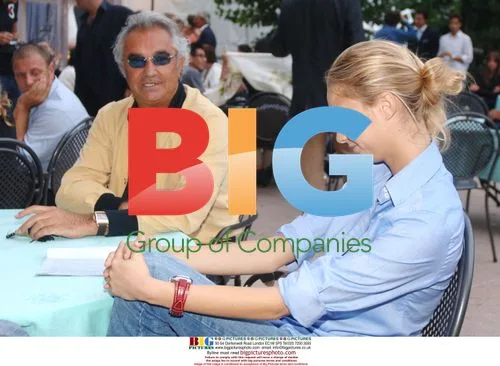 Flavio Briatore with Mystery Woman