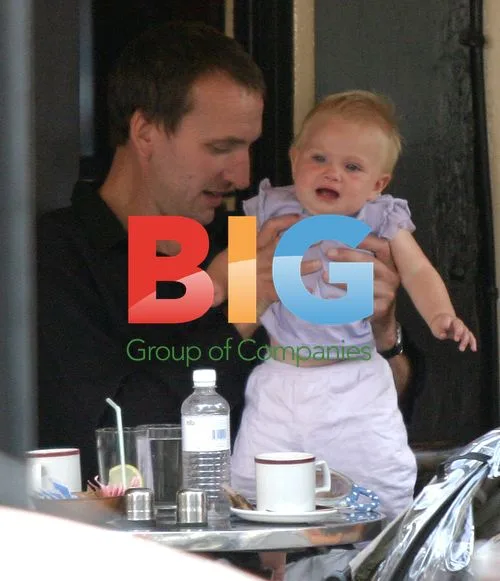 Christopher Eccleston with baby daughter