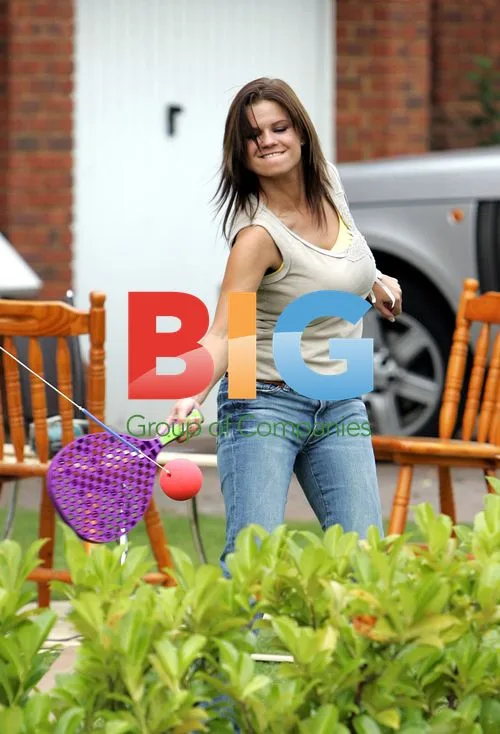 Kerry Katona plays swing tennis