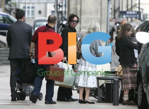 Tim Burton and Helena Bonham-Carter with son at Paris train station