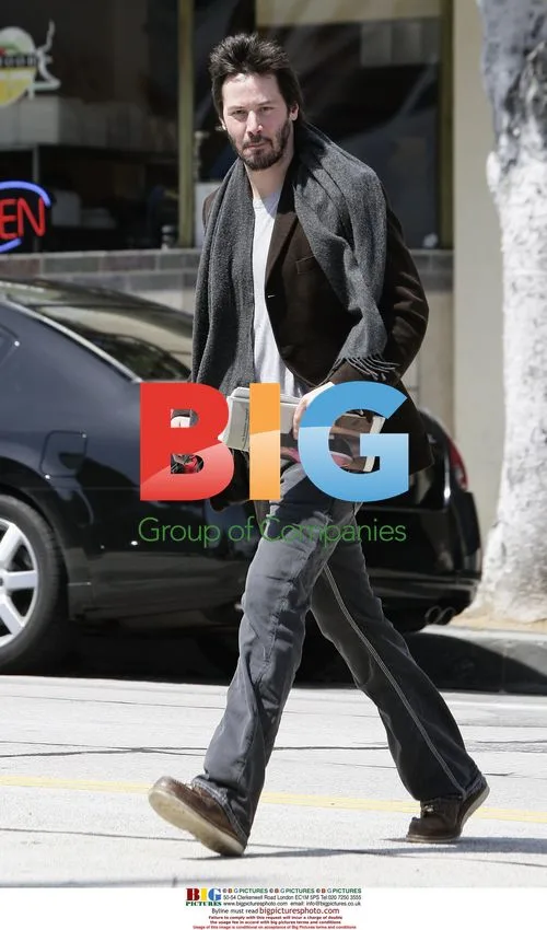 Keanu Reeves Getting Newspaper in West Hollywood