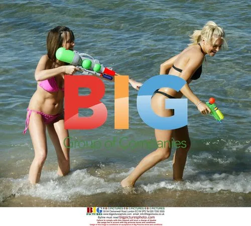 Models Kayleigh and Natasha Play in the Sea