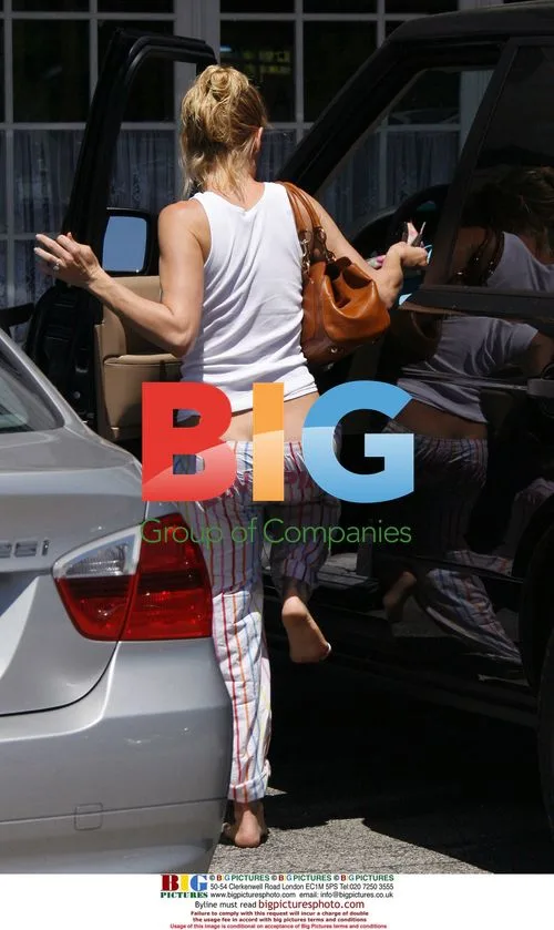 Nicolette Sheridan leaving salon barefoot