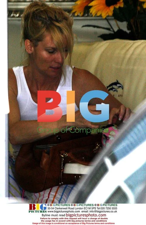 Nicolette Sheridan Leaving Salon Barefoot