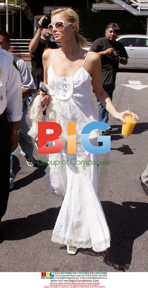 Paris Hilton stops for a drink