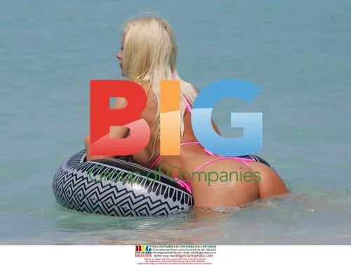 Model Emma B playing in the sea