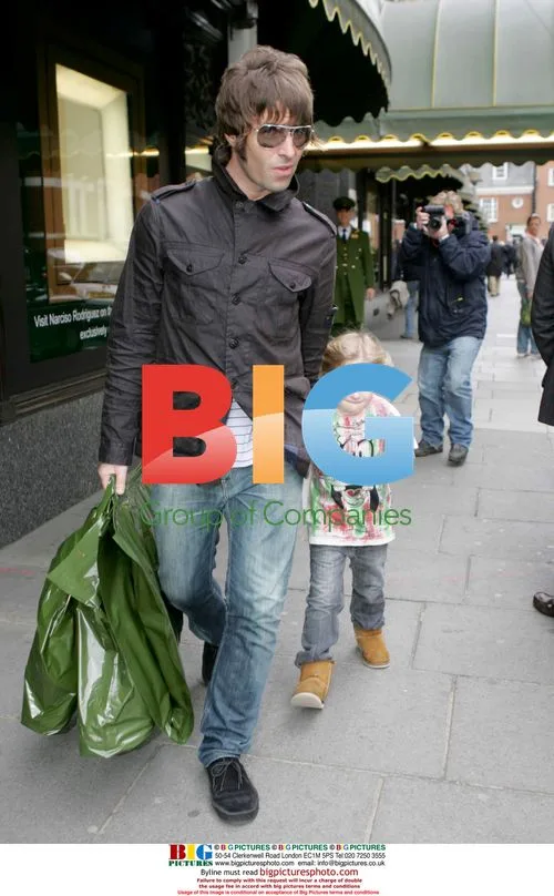 Liam Gallagher Spits at Paparazzi with Son Lennon