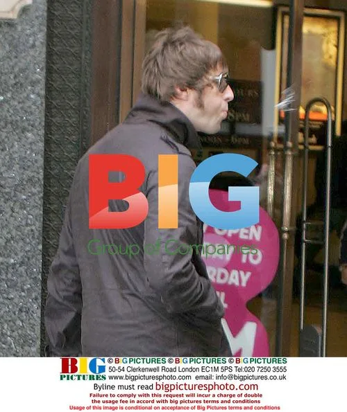 Liam Gallagher Spits at Paparazzi