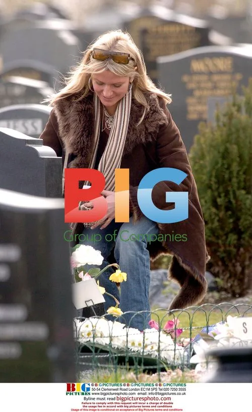 Alex Best visits George Best\'s grave in Belfast