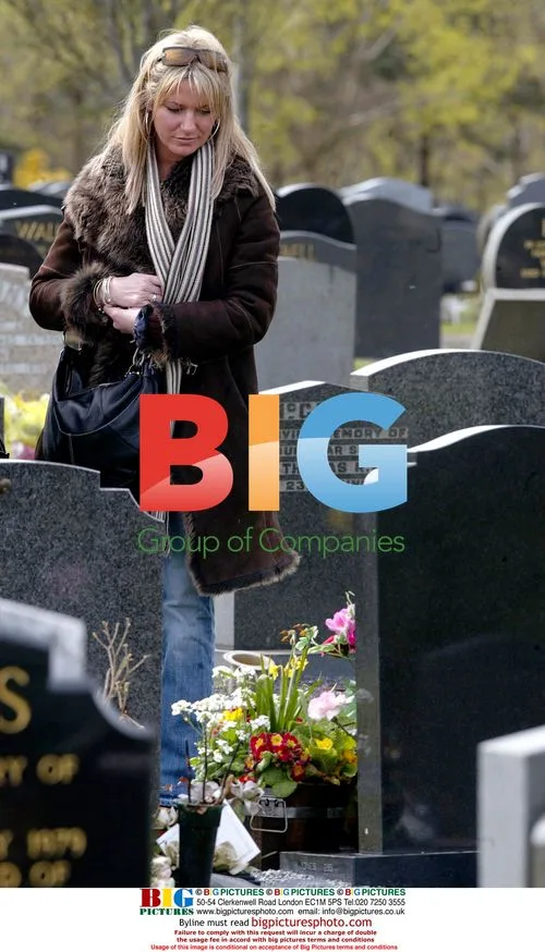 Alex Best visits George Best's grave