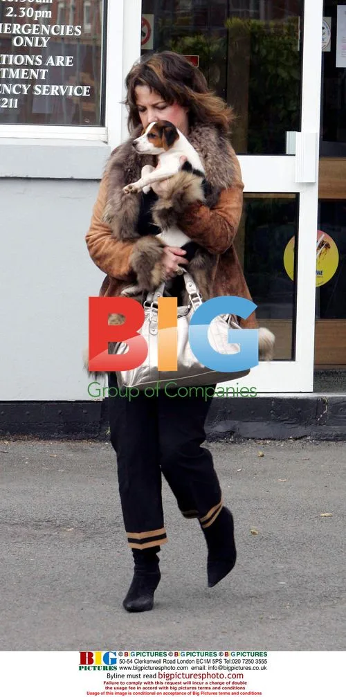 Charlotte Church takes puppies to vet with family