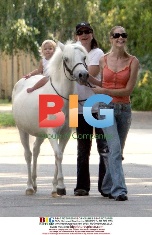 Denise Richards Bonds with Horses at New Home
