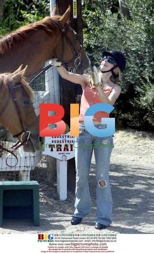 Denise Richards Bonds with Horses at New Home