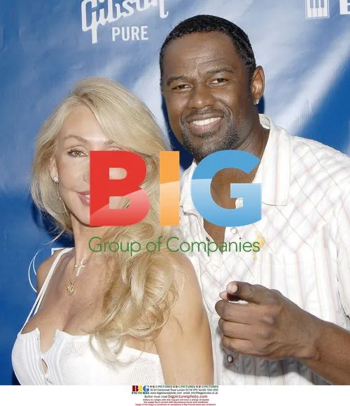 Linda Thompson-Williams and Brian McKnight at 'Night at the Net'