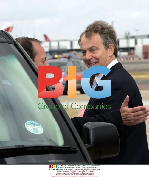Tony Blair arrives at Heathrow from LA