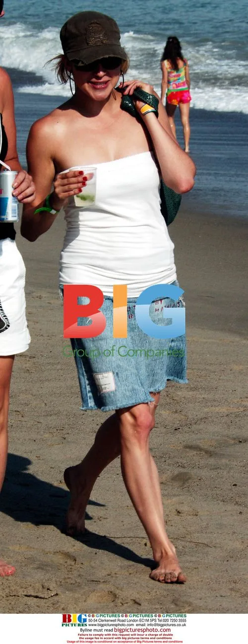 Samaire Armstrong Walks on Malibu Beach