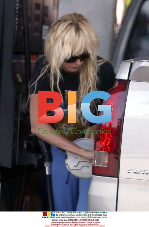 Kimberly Stewart Grabs Red Bull Before Shopping