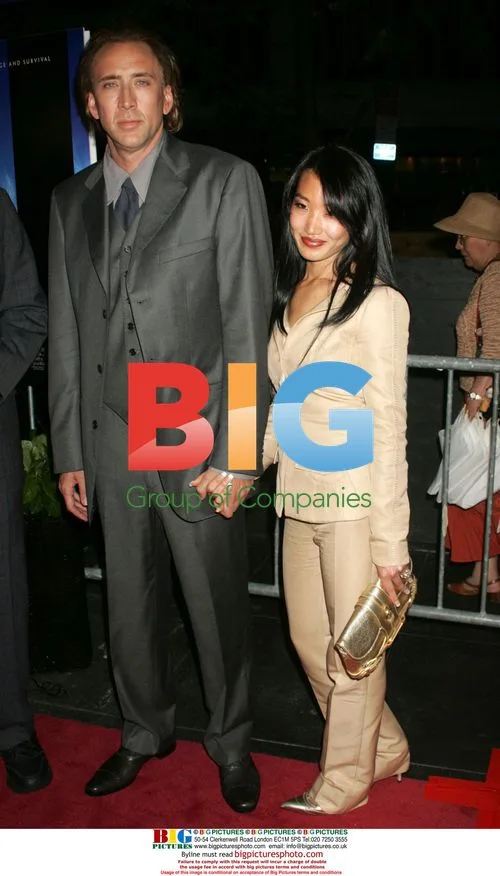 Nicolas Cage and Alice Kim at 'World Trade Center' Premiere