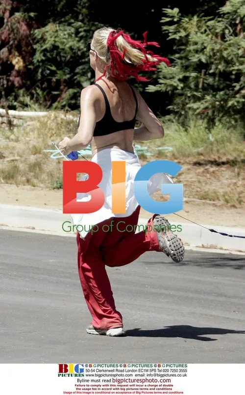 Nicollette Sheridan Jogging with Dog