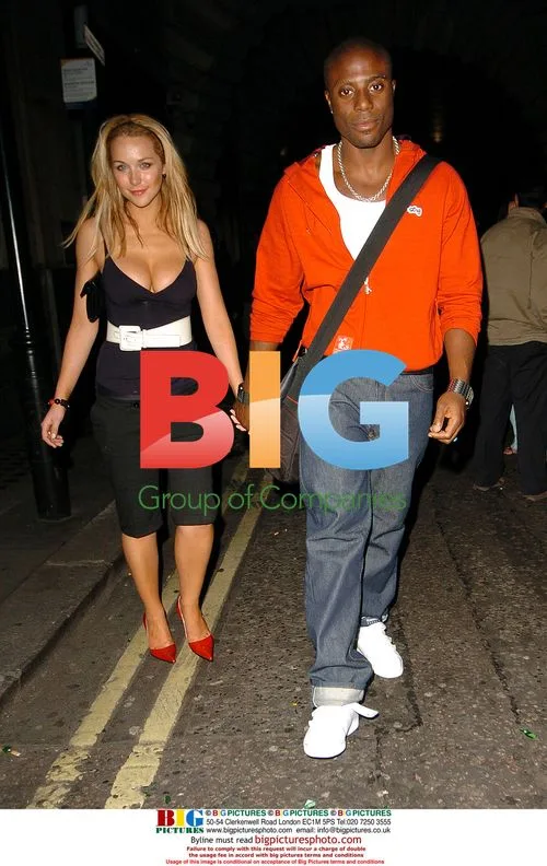 Leo Ihenancho and girlfriend leaving Chinawhites