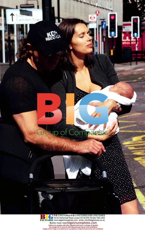 Heather Stewart-Whyte with partner and baby
