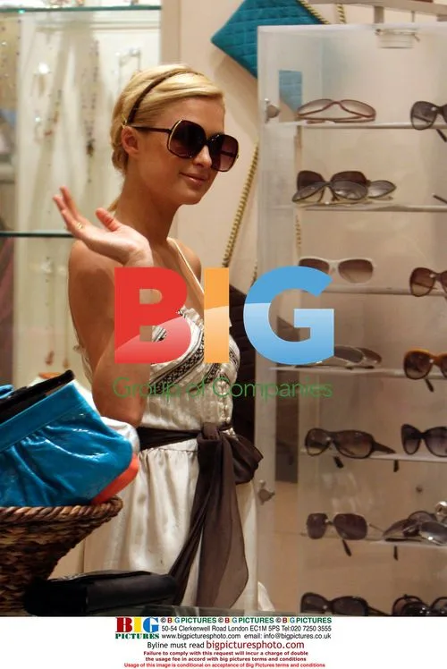 Paris Hilton Shops with Cuts on Arm